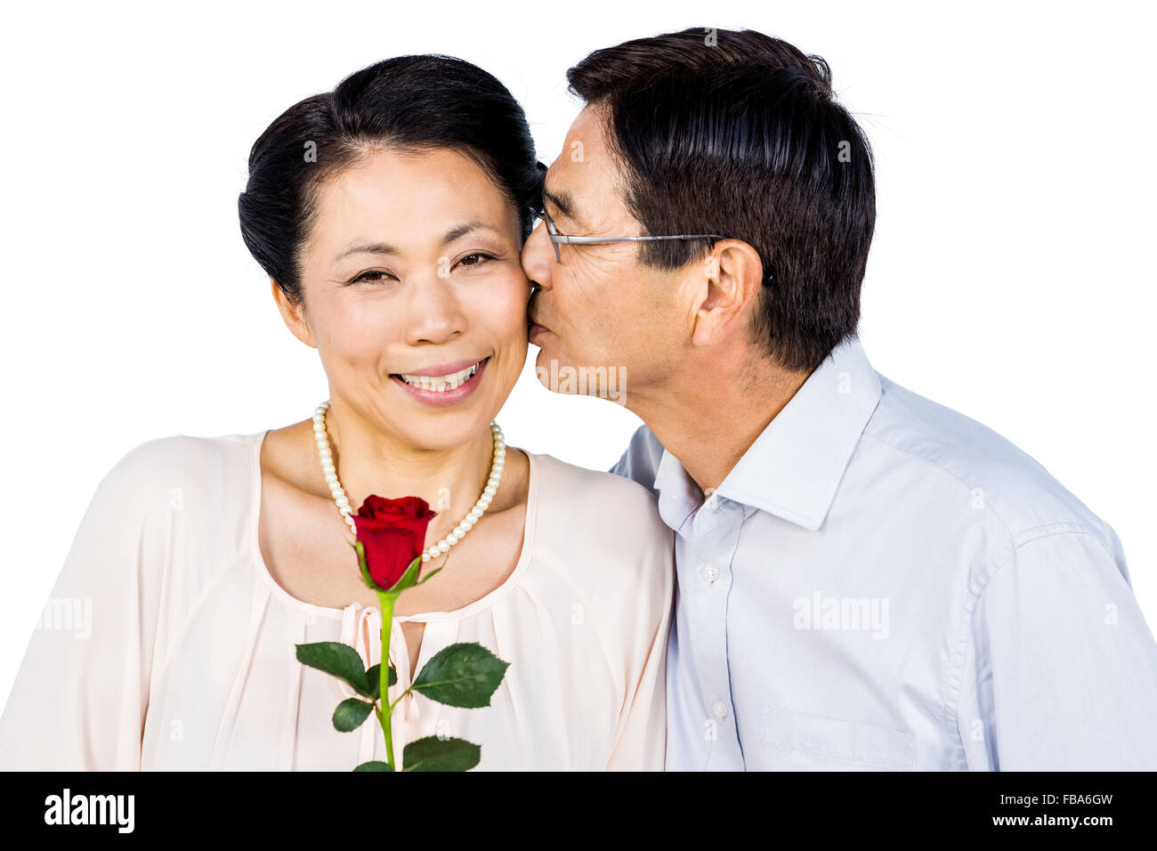 Ältere asiatische paar mit rose Stockfoto