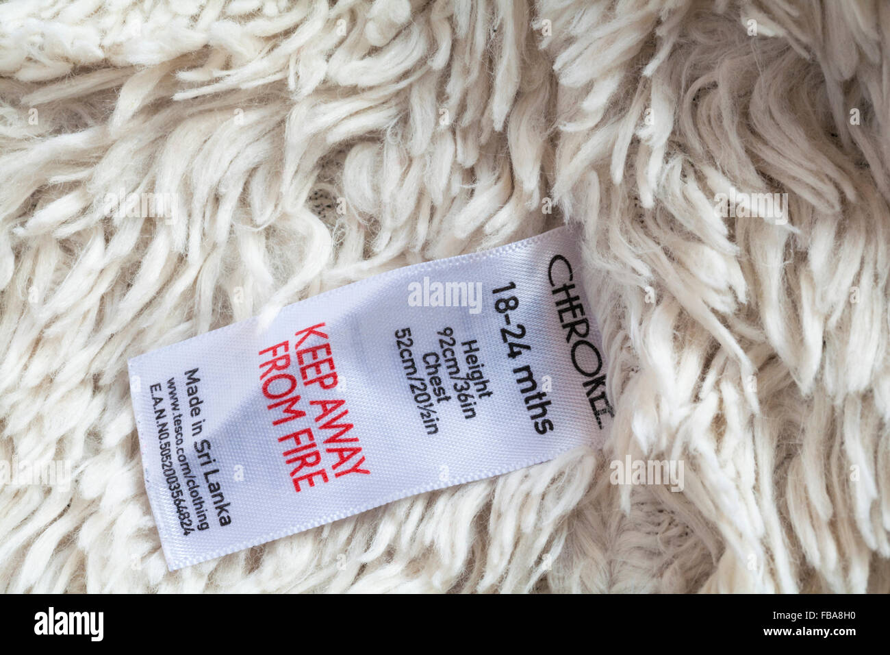 In der Nähe von Brand Label in Jacke's Cherokee Kleinkind in Sri Lanka gemacht - im UK Vereinigtes Königreich, Großbritannien verkauft. Stockfoto