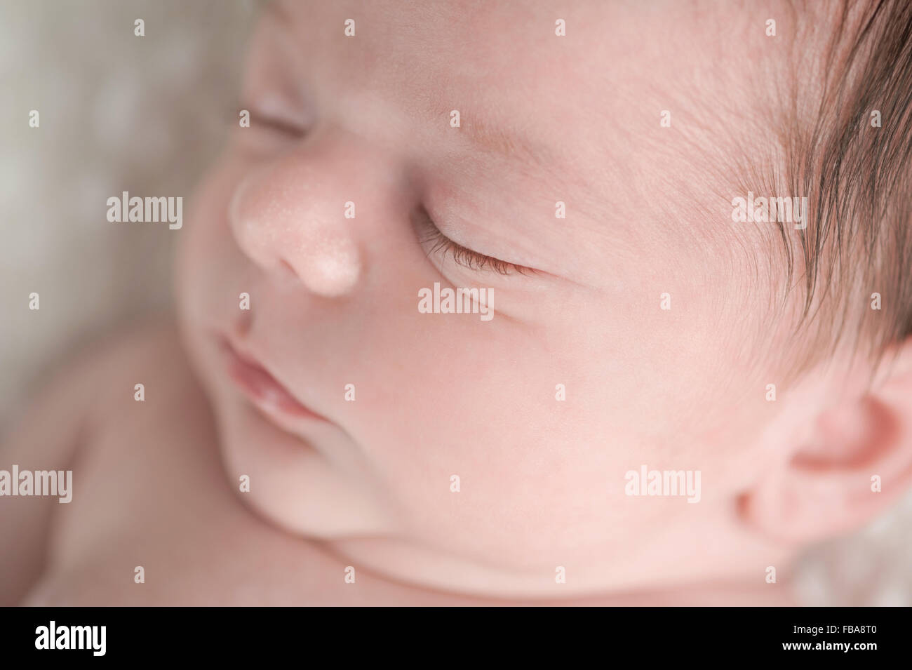 Ein neugeborenes Baby junge Gesicht Nahaufnahme Schuss Stockfoto