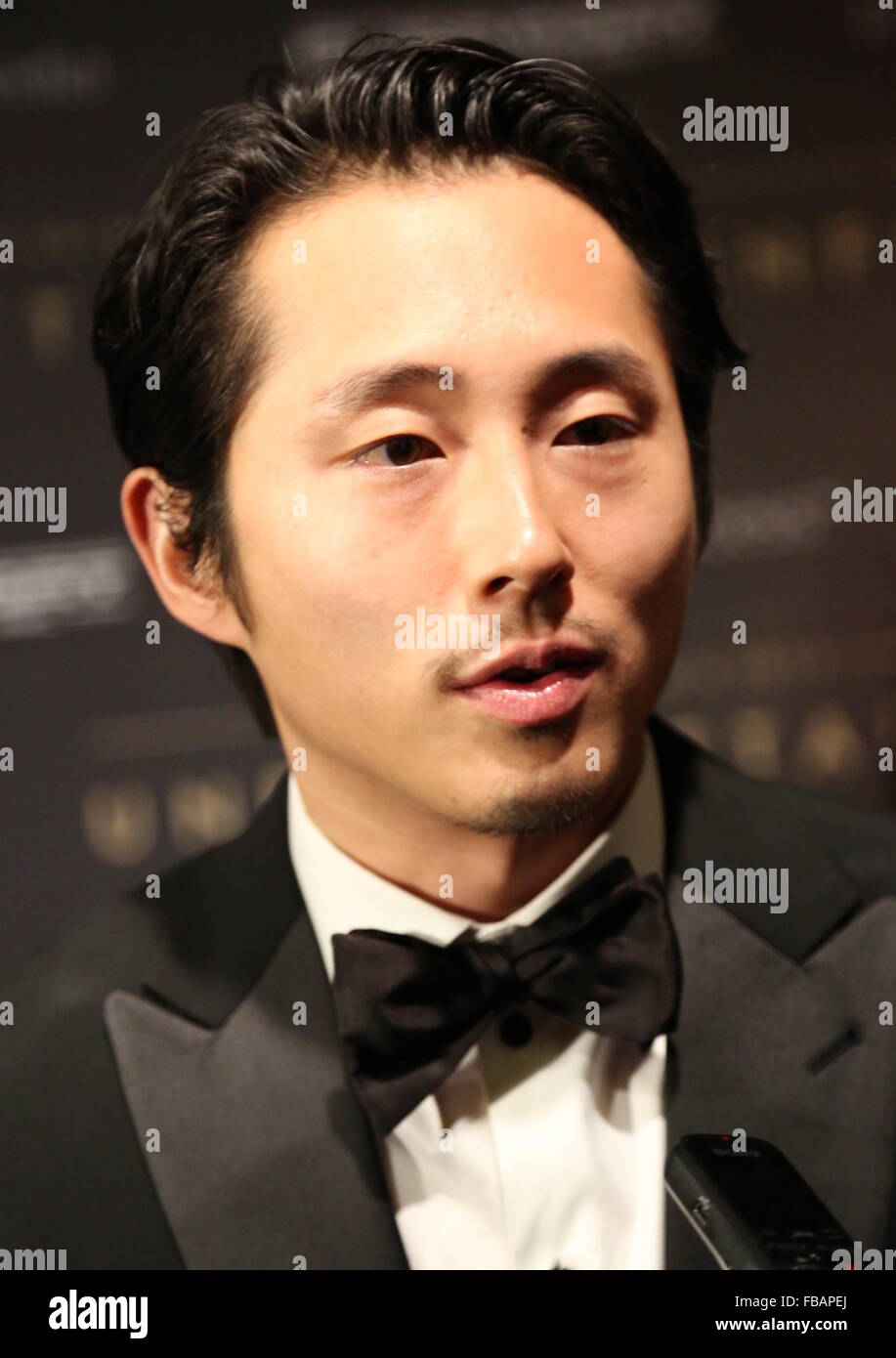 Unvergessliche Gala - asiatisch-amerikanische Awards statt, bei The Beverly Hilton Featuring: Steven Yeun Where: Los Angeles, California, Vereinigte Staaten von Amerika bei: 12. Dezember 2015 Stockfoto