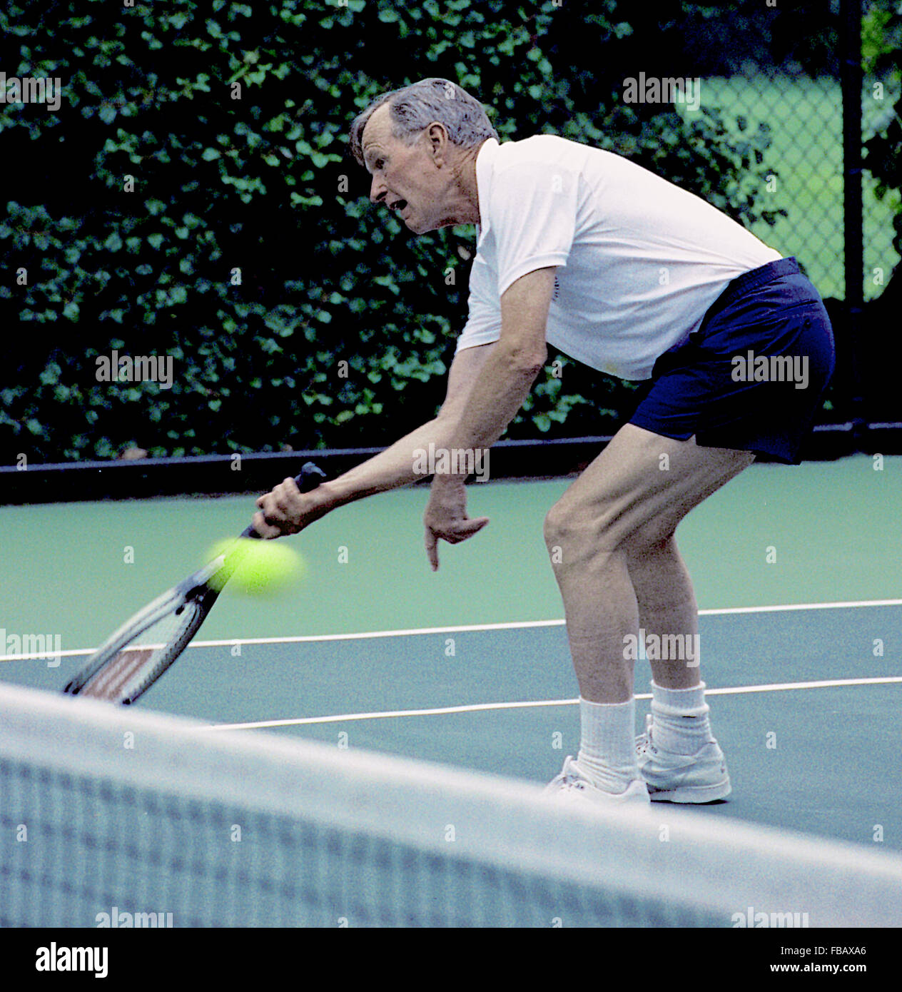 Washington, DC. USA, 2. Juli 1991 Präsident George H.W. Bush spielt Doppel mit koreanischen Roh Tae Woo Credit: Mark Reinstein Stockfoto