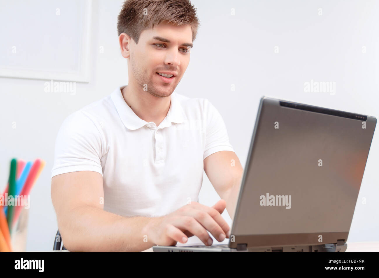 Schüler arbeiten am laptop Stockfoto