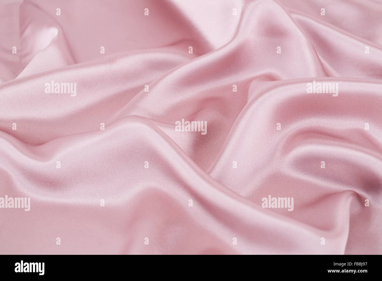Rosa Seide Stoff für den Hintergrund. Stockfoto
