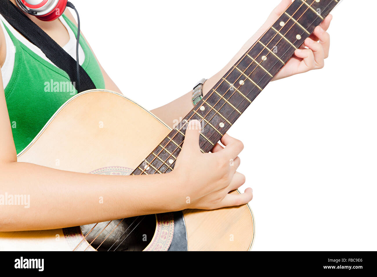 1 junge Frau College Student Playing Guitar Stockfoto