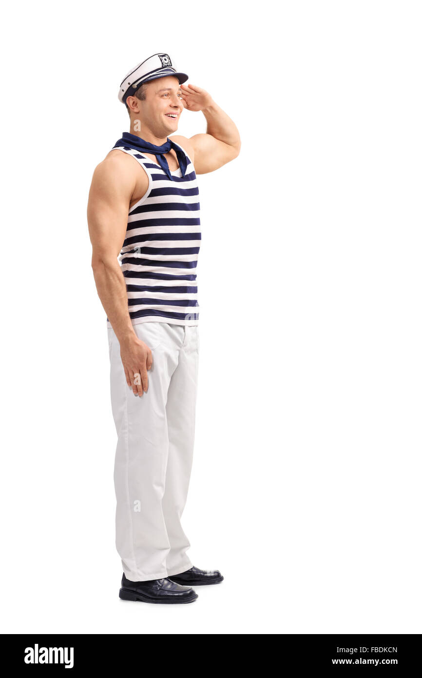 Voller Länge Porträt eines jungen Matrosen gerade stehend und grüßte jemand isoliert auf weißem Hintergrund Stockfoto