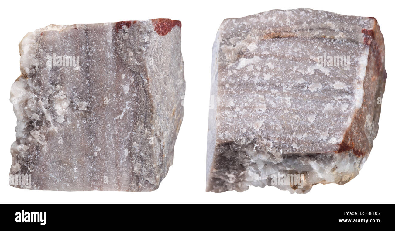 Makroaufnahmen Probe Naturstein - zwei Stücke von Rhyolith Mineral Stein isoliert auf weißem Hintergrund Stockfoto