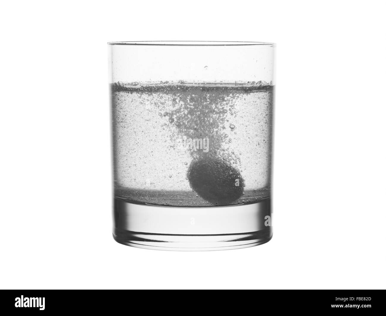 Glas Wasser und Medizin. Schwarz und weiß. Stockfoto Glas Wasser und Medizin. Schwarz und weiß. Stockfoto