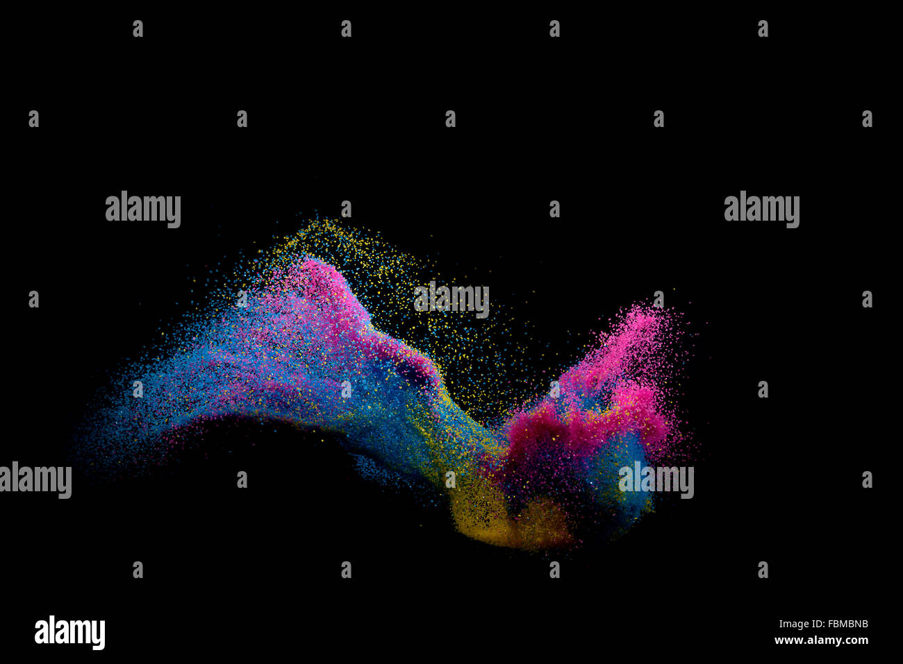 Mehrfarbiger Sand auf schwarzem Hintergrund Stockfoto