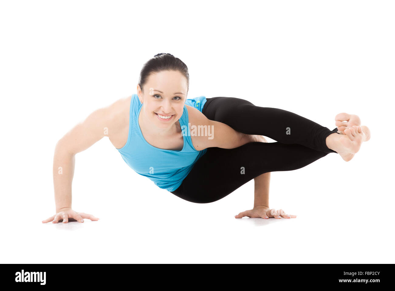 Sportliche Yogi Mädchen tun Fitness-Übungen, Yoga Asana Astavakrasana, asymmetrische Arm Saldo acht Winkel darstellen, isoliert Stockfoto