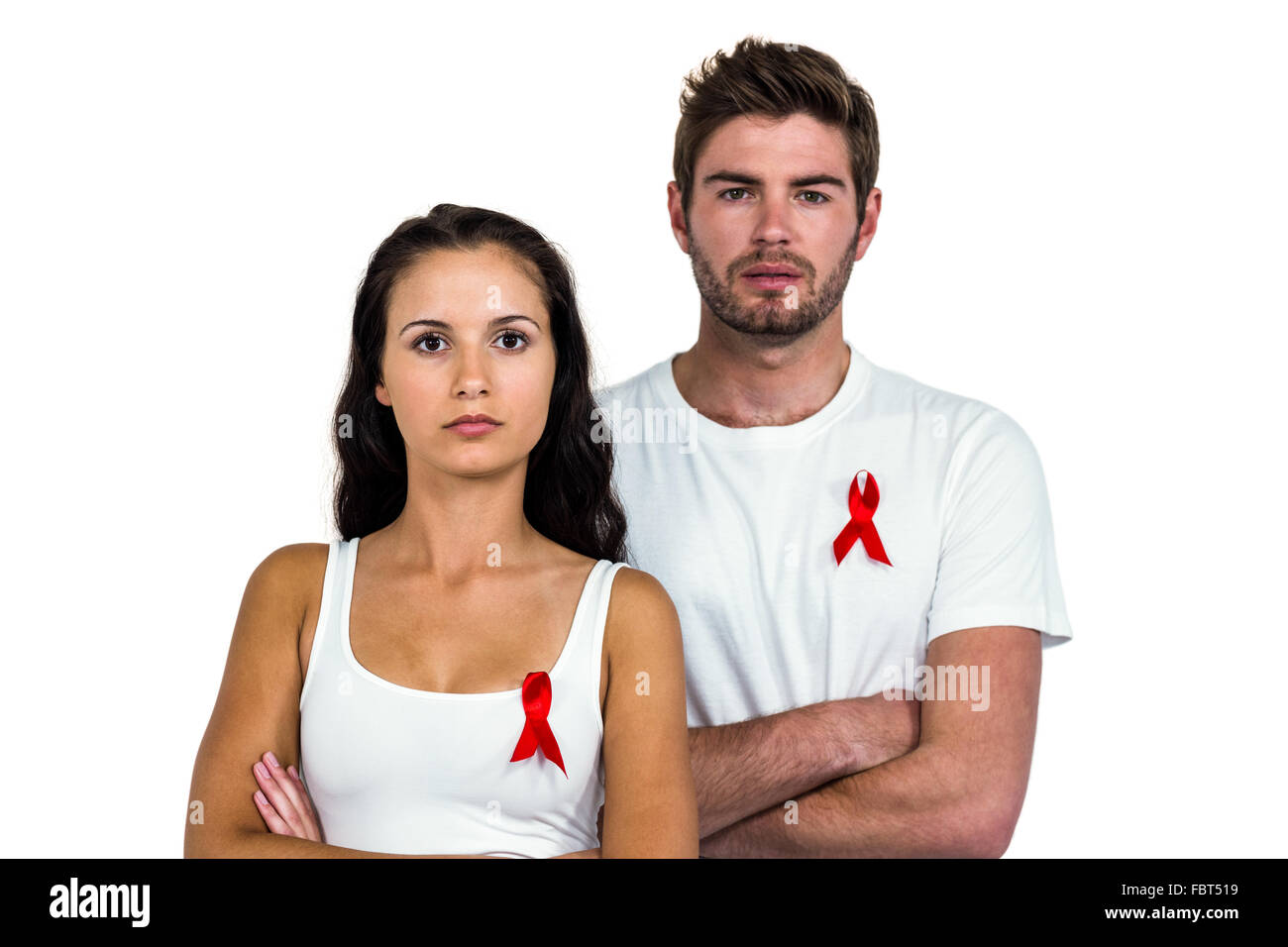 Porträt von Ernst paar mit verschränkten Armen Stockfoto