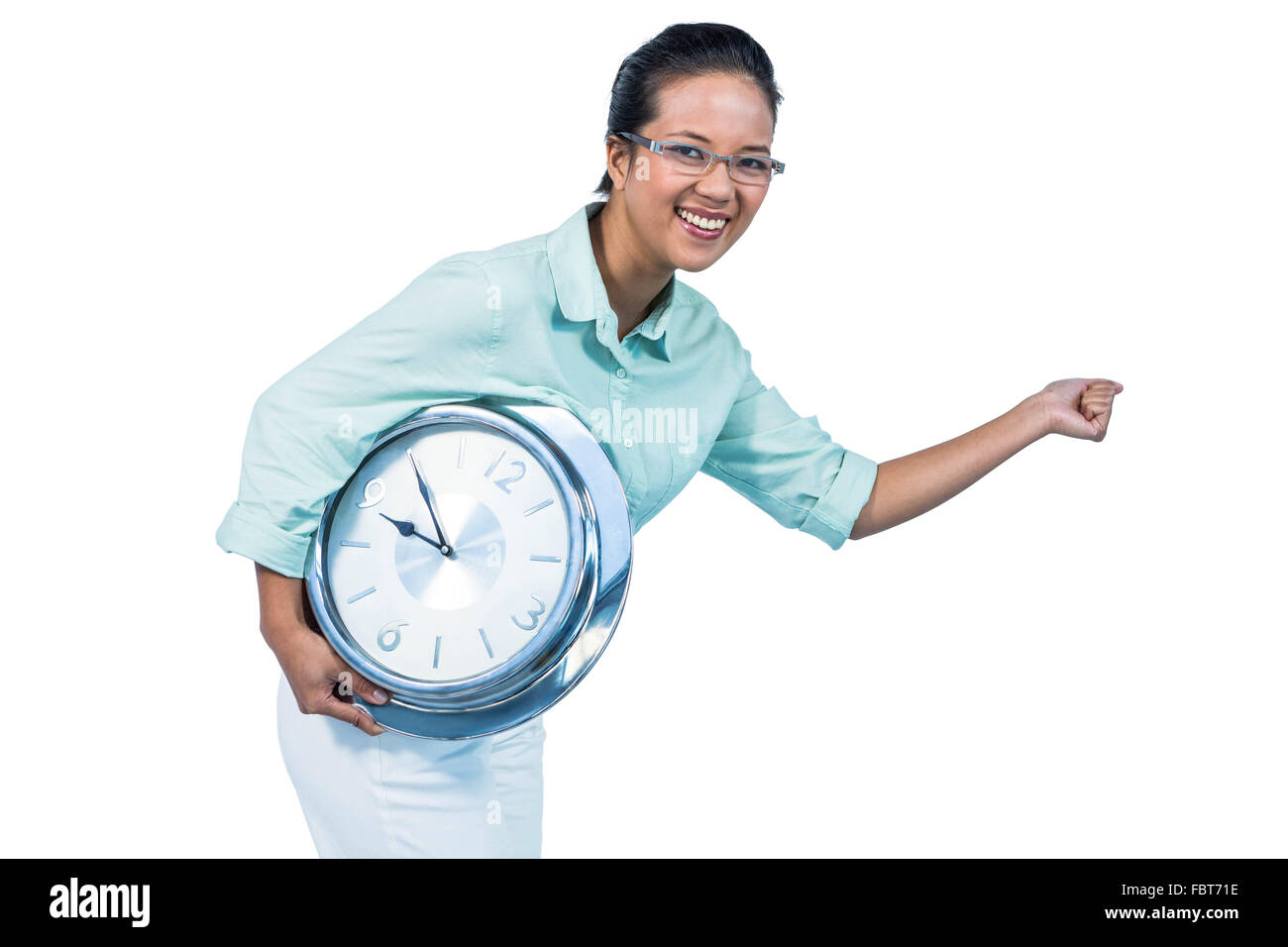 Hocherfreut Geschäftsfrau hält eine Uhr Stockfoto