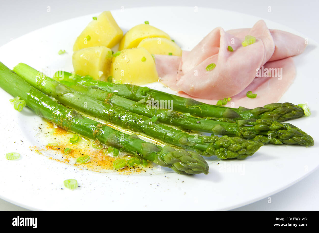 grüner Spargel-Butter-sauce Stockfoto