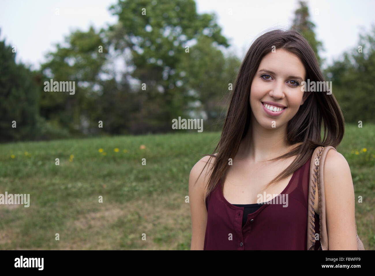 Lächeln im Park - Exemplar Stockfoto
