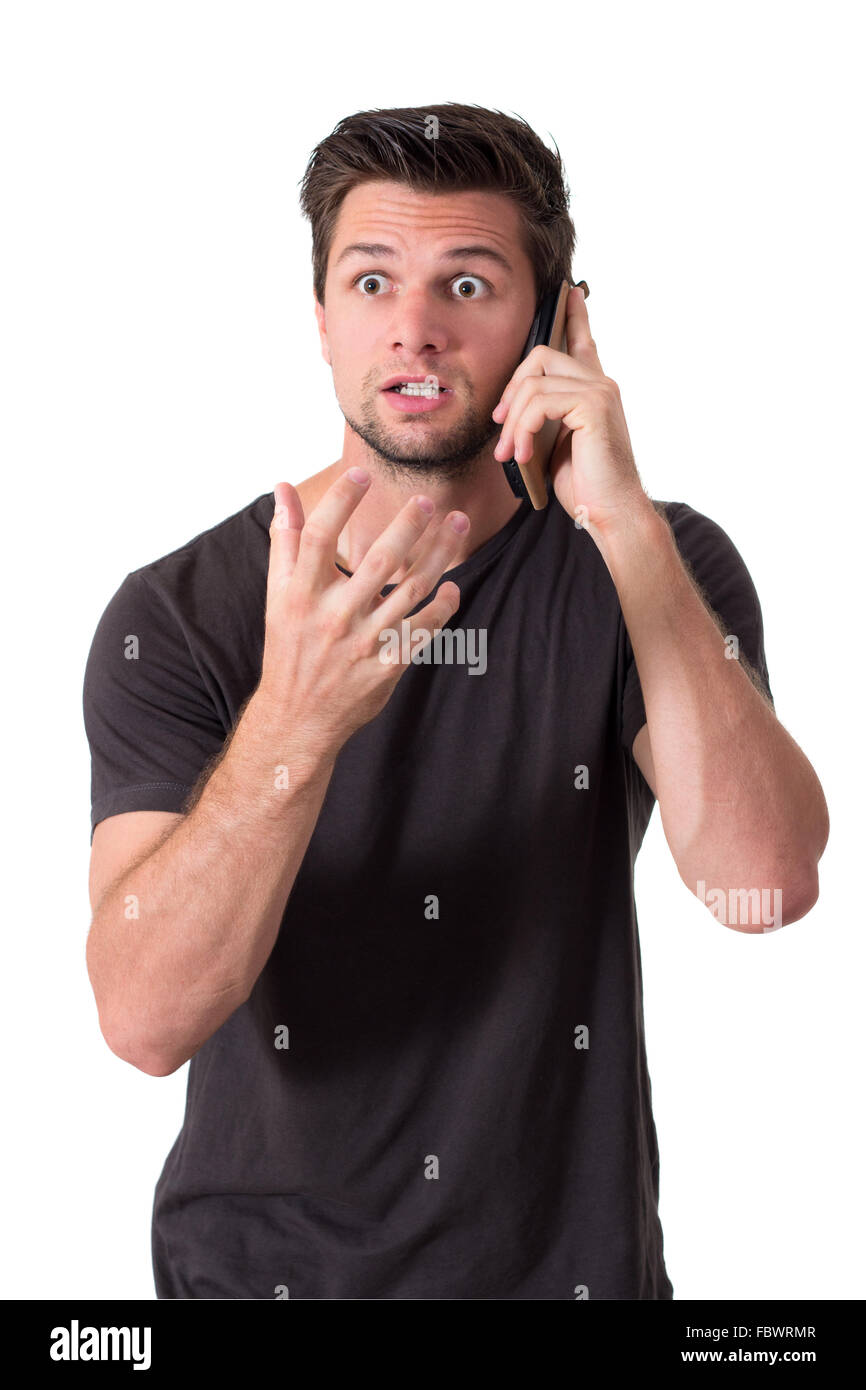 Junger Mann sehr böse reden über Telefon Stockfoto