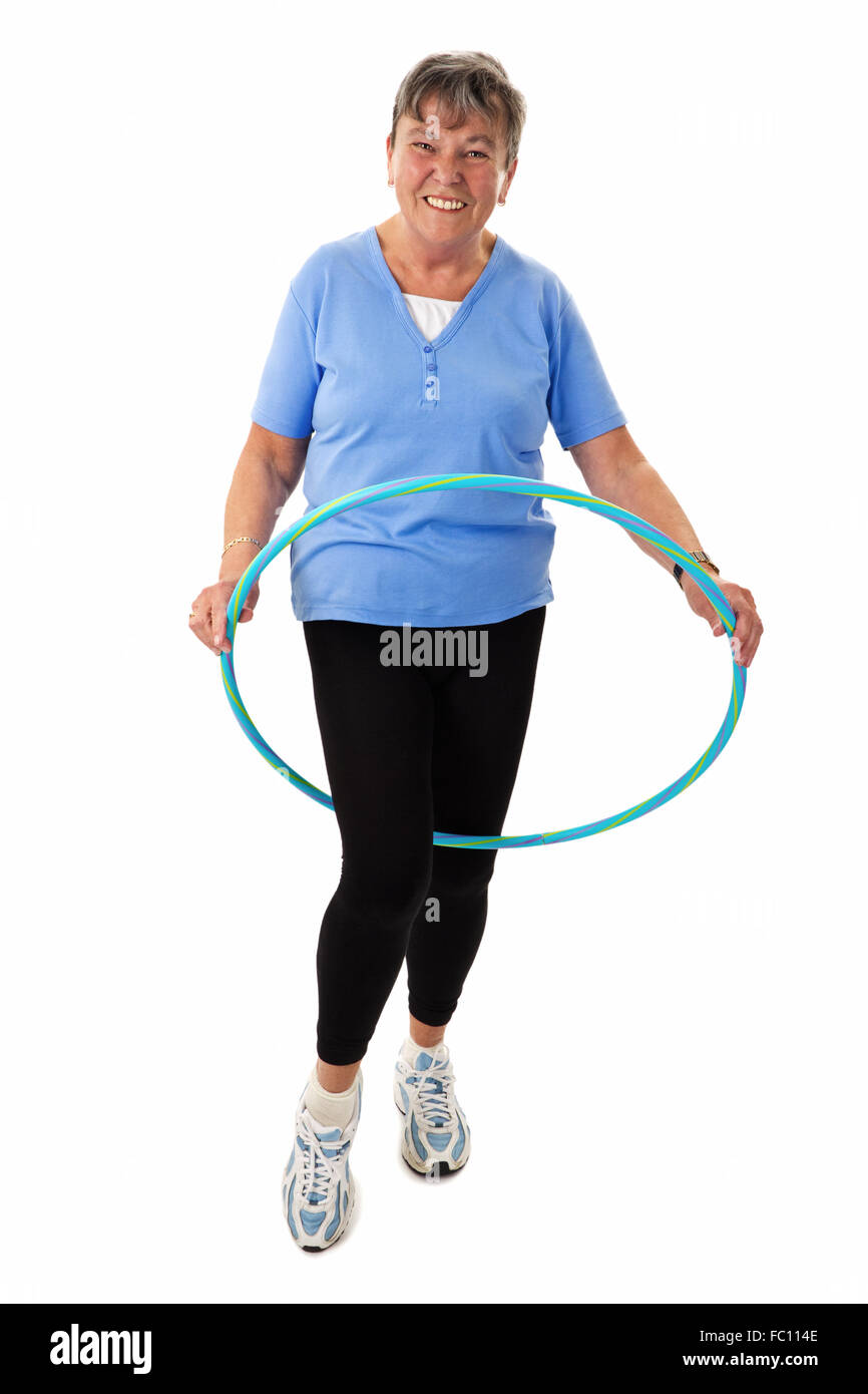 Ältere Frau mit hula-hoop Stockfoto