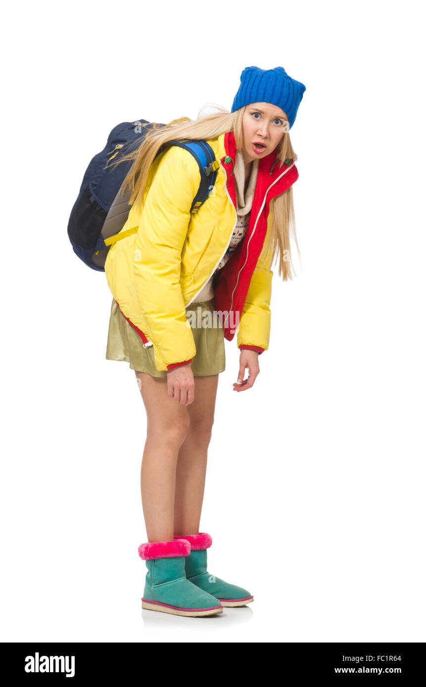 Ein Mädchen in hellen Winterkleidung isoliert auf weiss Stockfoto