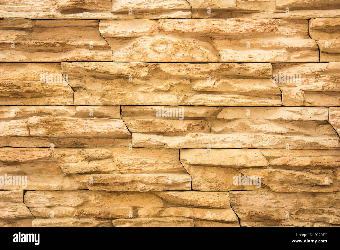 , die graue Musterfarbe des modernen Stil Design dekorative rissige echtem Stein Wand Unebenheiten mit Zement Stockfoto