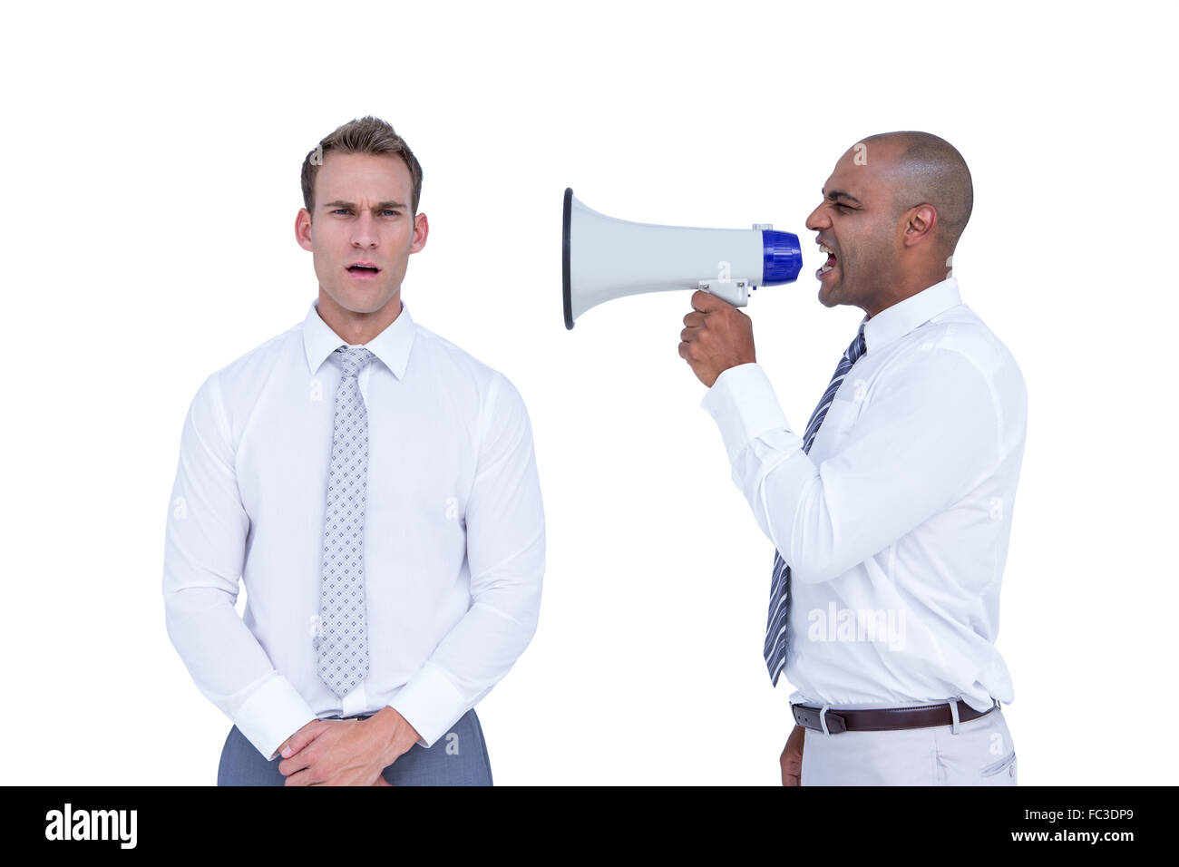 Geschäftsmann mit einem Megaphon an seinem Kollegen schreien Stockfoto