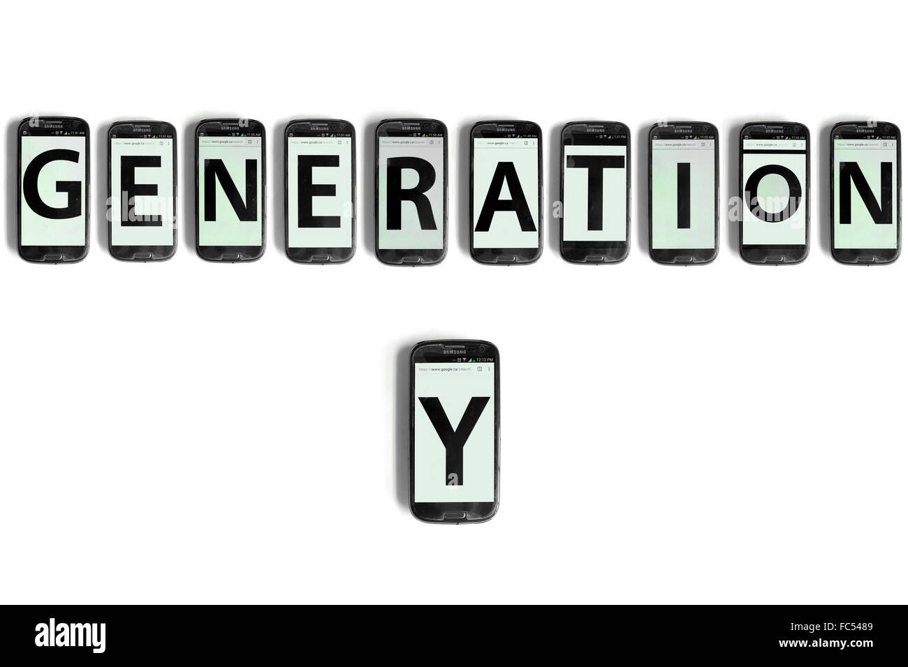 Generation Y geschrieben auf den Bildschirmen der Smartphones vor weißem Hintergrund fotografiert. Stockfoto