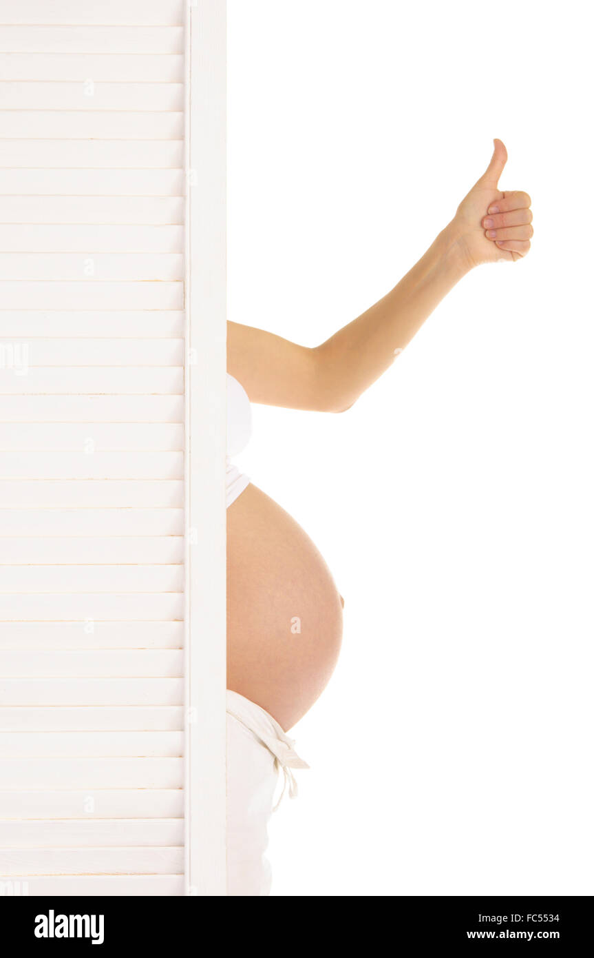 Magen und Hand schwangere Frau Stockfoto