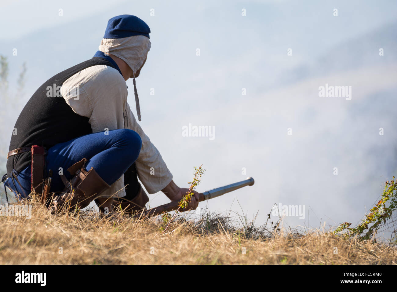 Person mit historischen Waffe Stockfoto