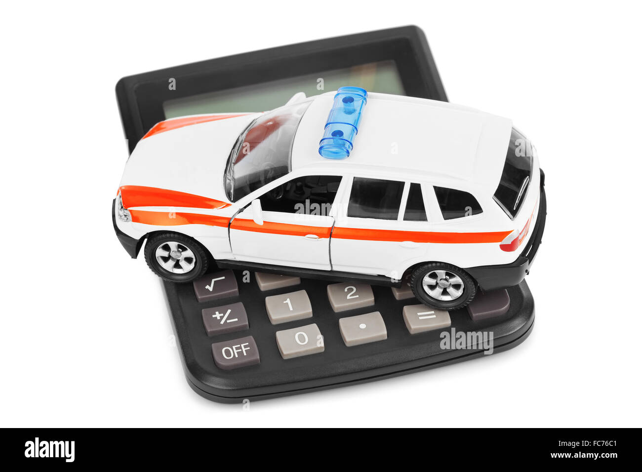 Rechner und Spielzeug Polizeiauto Stockfoto