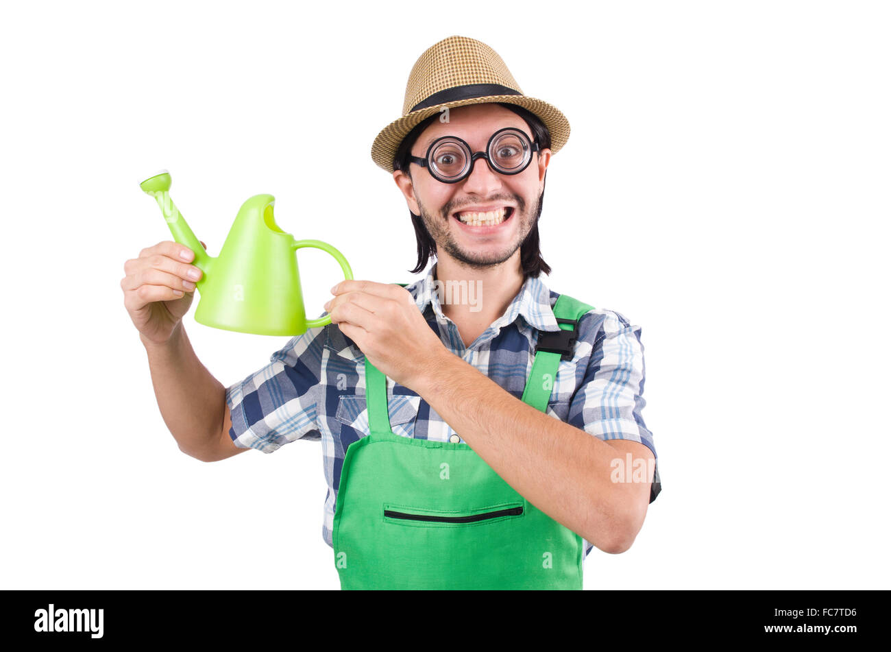 Junge fröhlich Gärtner mit Gießkanne isoliert auf weiss Stockfotografie
