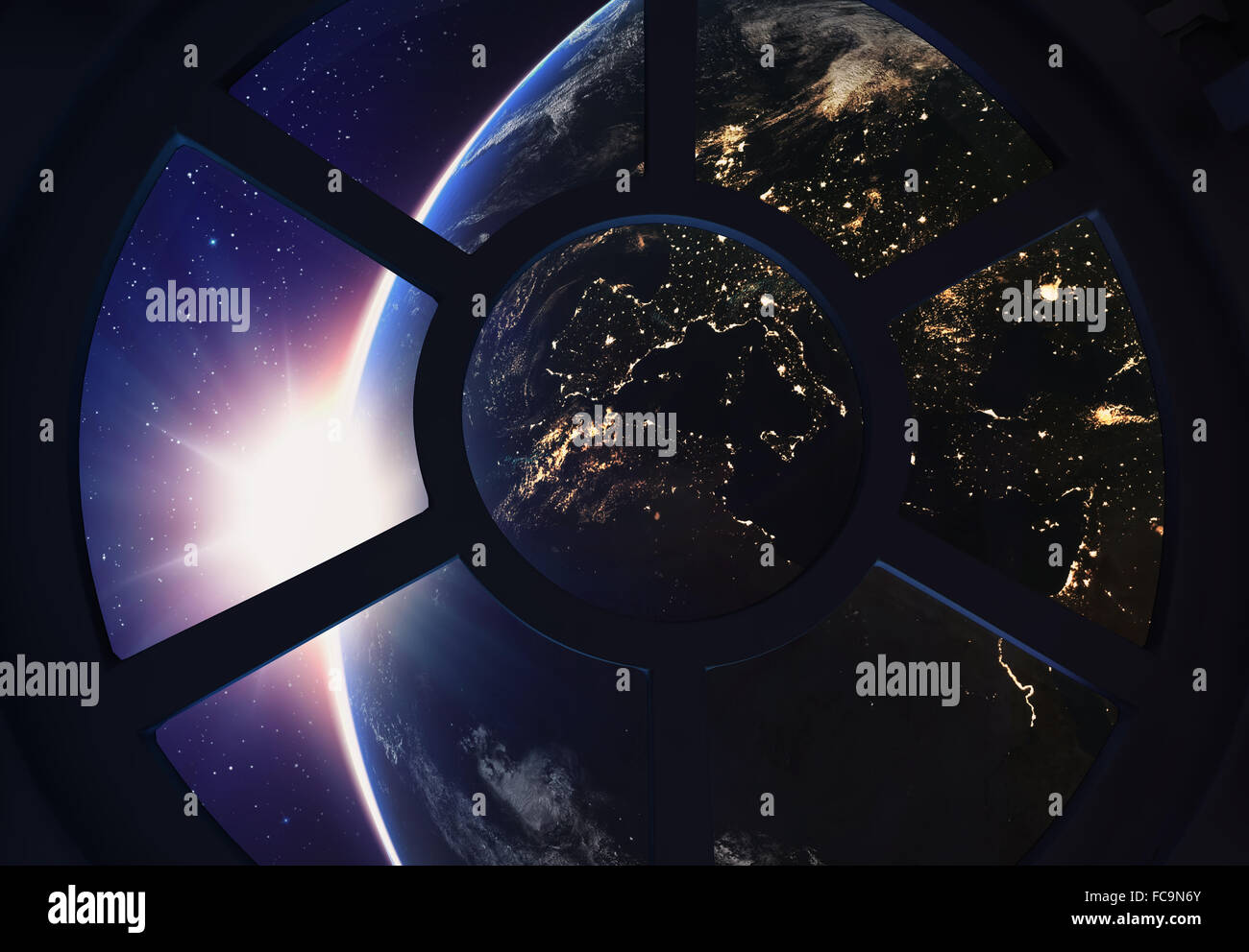 Ein rundes Fenster auf einer Raumstation mit einem Blick auf die Erde unten Stockfoto
