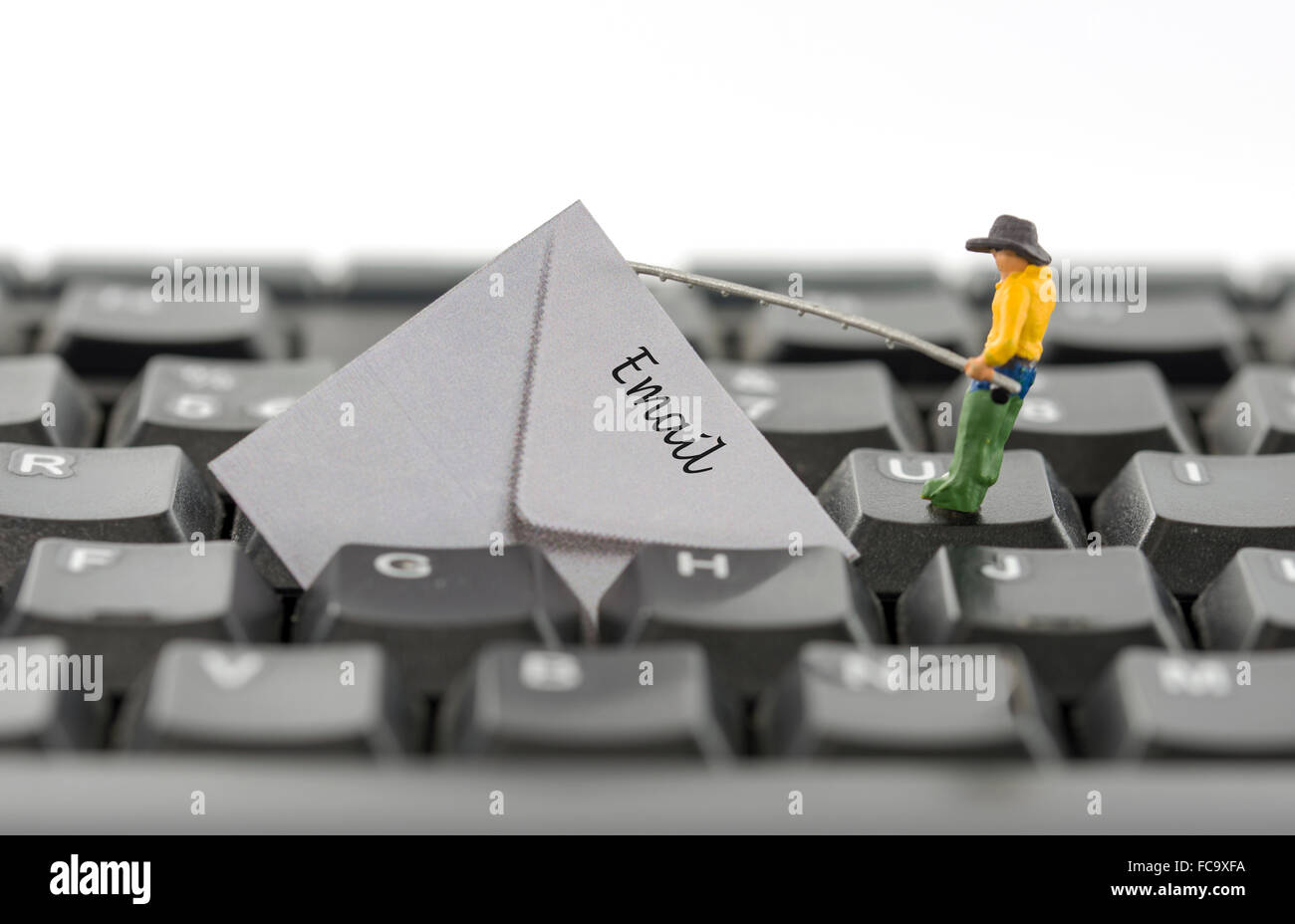 mailen Sie Angeln und hacking von kleinen Leuten Stockfoto