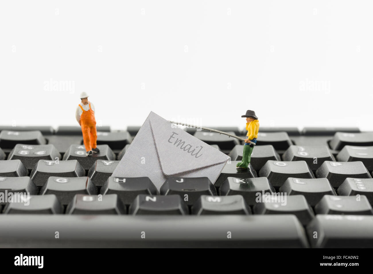 mailen Sie Angeln und hacking von kleinen Leuten Stockfoto