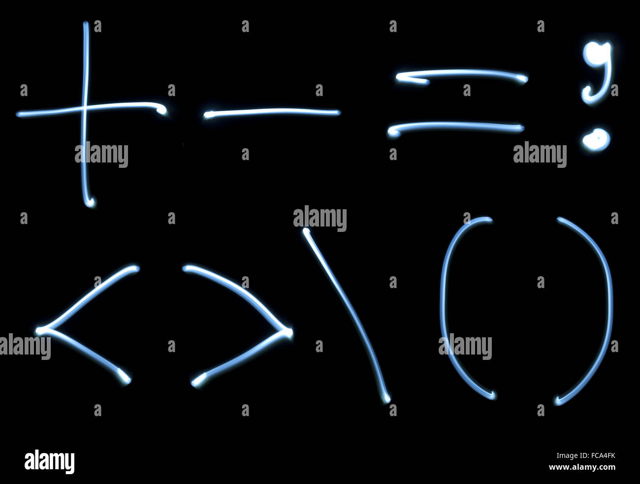 Mathematische Zeichen gesetzt von Neonlicht Stockfoto