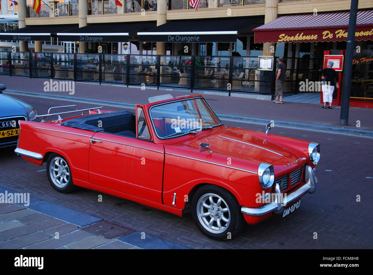 klassische rote Triumph Herald Cabrio Stockfoto