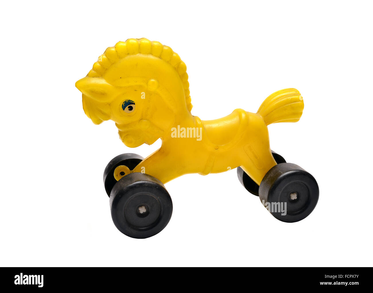 Gelbes Pferd kommunistischen Ära Retro-Spielzeug auf weißem Hintergrund Stockfoto