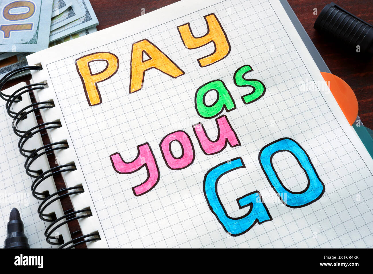 Pay As You Go Umlagefinanzierten geschrieben auf einem Notebook. Business-Konzept. Stockfoto