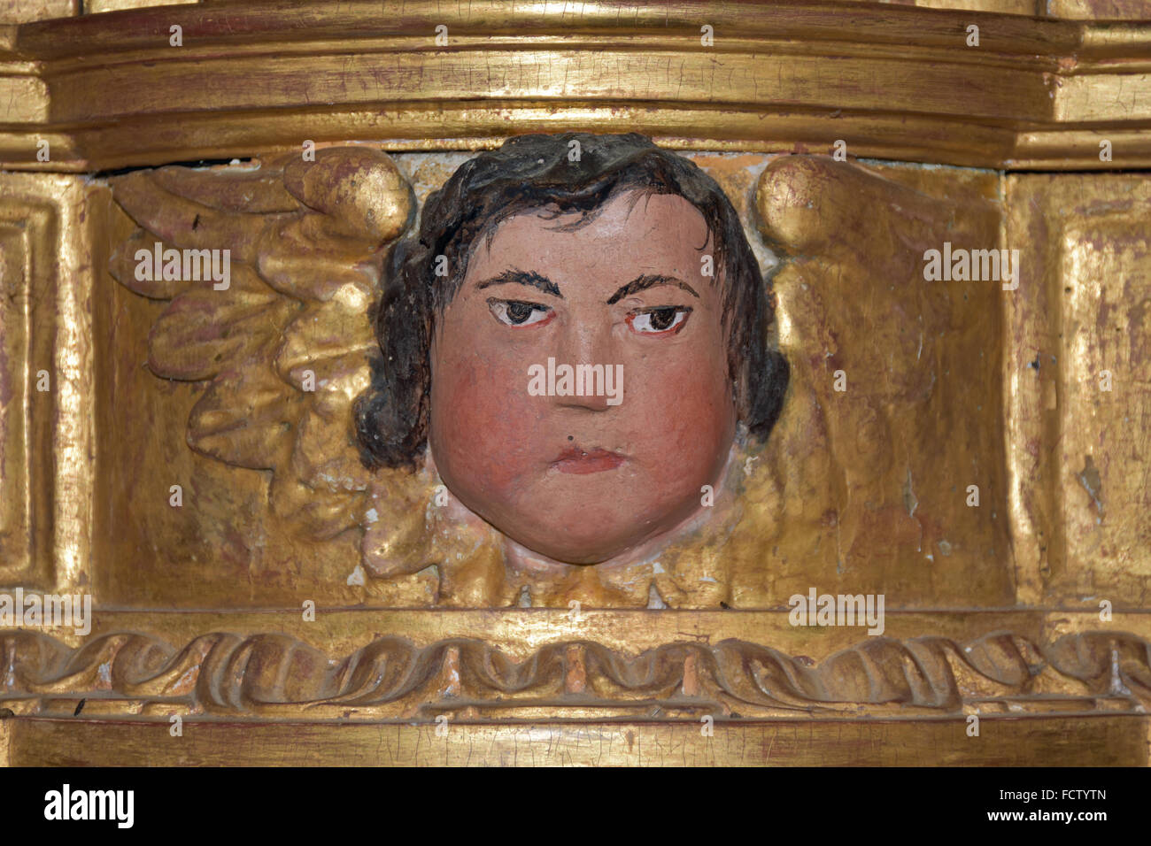 Gesicht in Altarbild der Eglise de Diusse, Frankreich Stockfoto