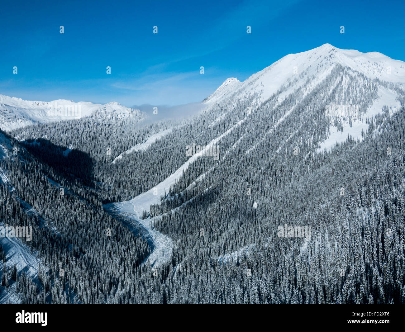 Aerial Winter Ansicht der Selkirk Mountains in der Nähe von entfernten Mount Carlyle Lodge;  Britisch-Kolumbien; Kanada Stockfoto