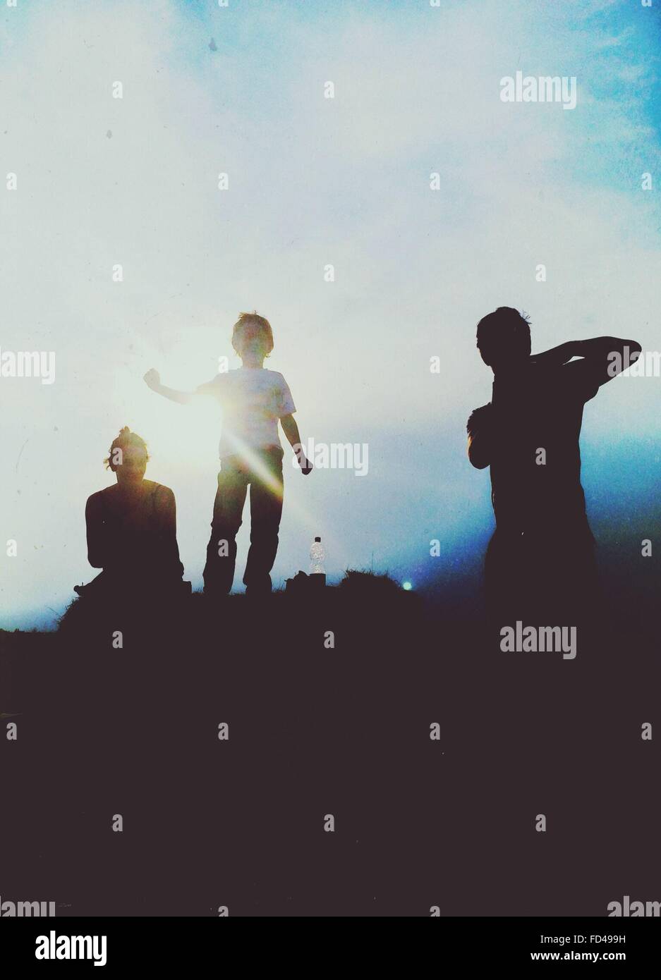 Silhouetten von Menschen In der Sonne Stockfoto