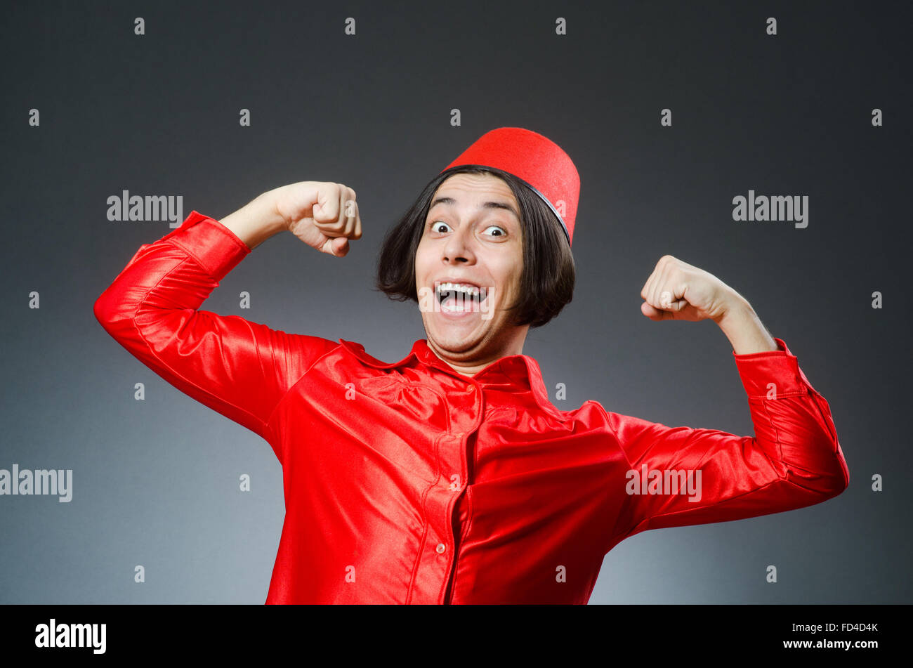 Der Mann mit roten Fez Hut Stockfoto