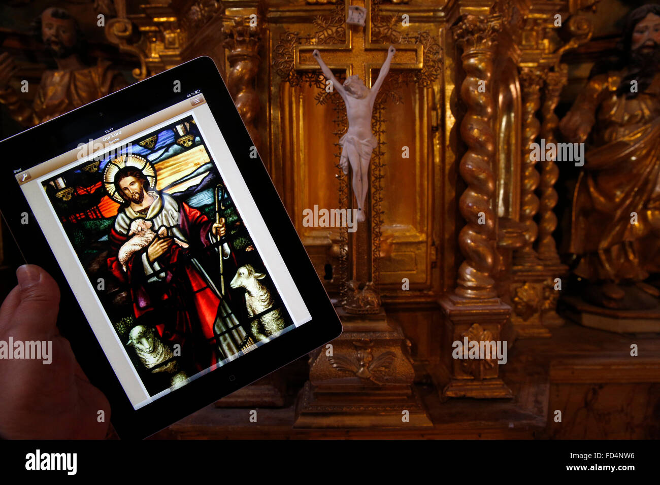 Bild von Jesus Christus auf dem Ipad in einer Kirche. Stockfoto