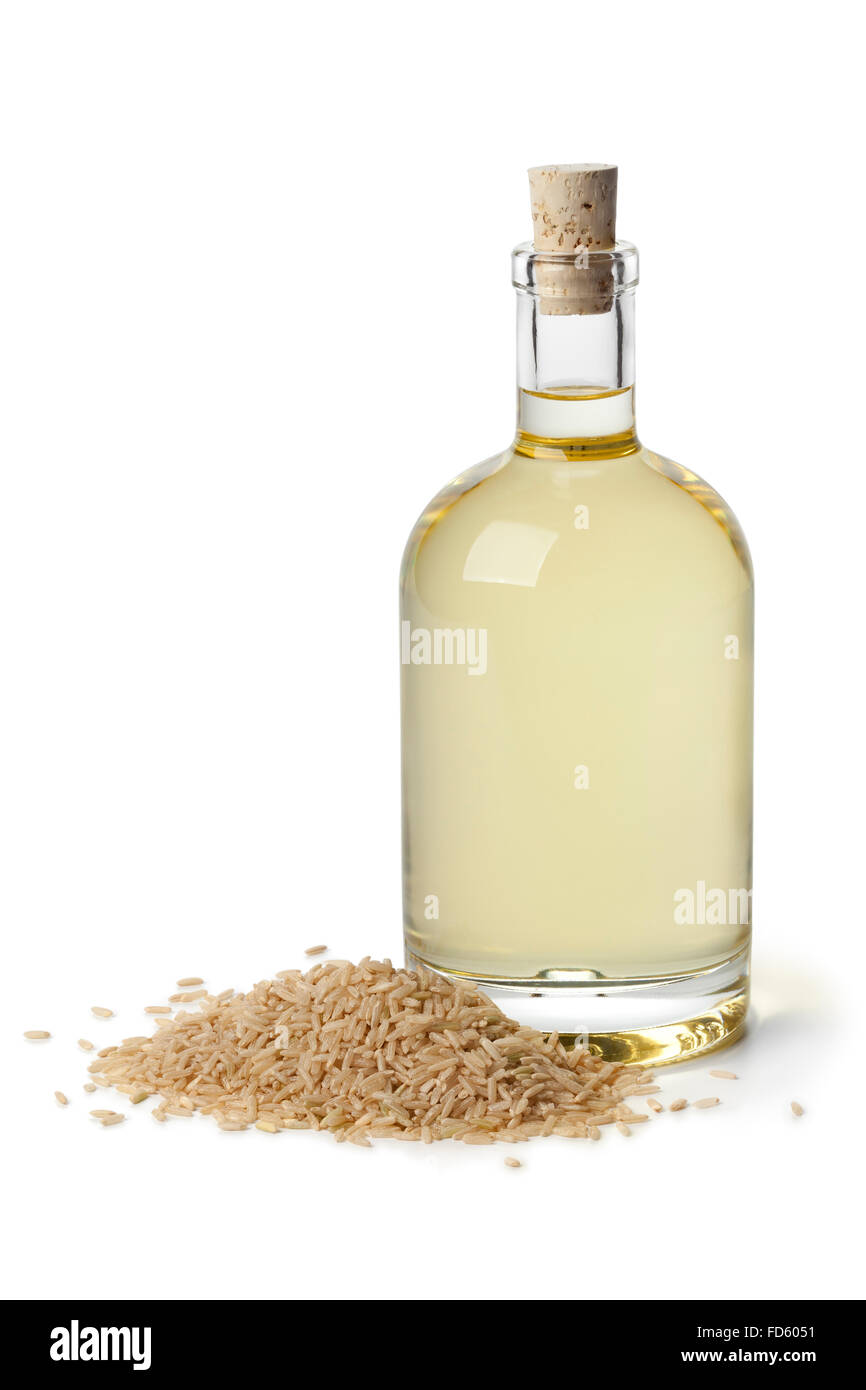 Reis-Öl in der Flasche auf weißem Hintergrund Stockfoto