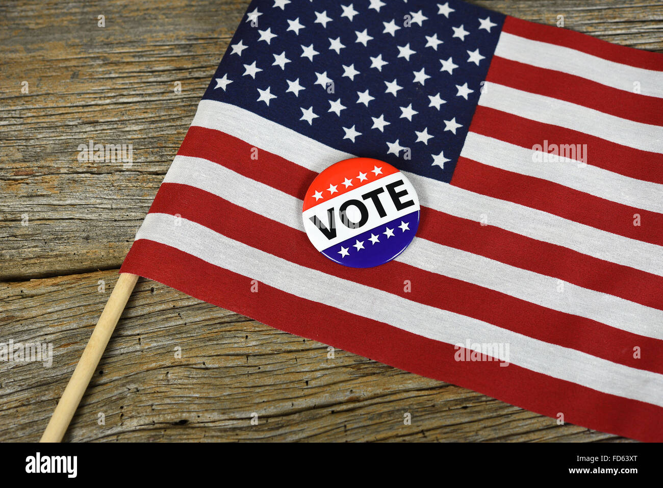 Kampagne-Abstimmung-Taste auf amerikanische Flagge. Stockfoto