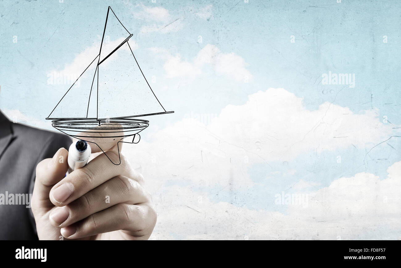 Nahaufnahme der Geschäftsmann Hand Zeichnung Yacht mit marker Stockfoto
