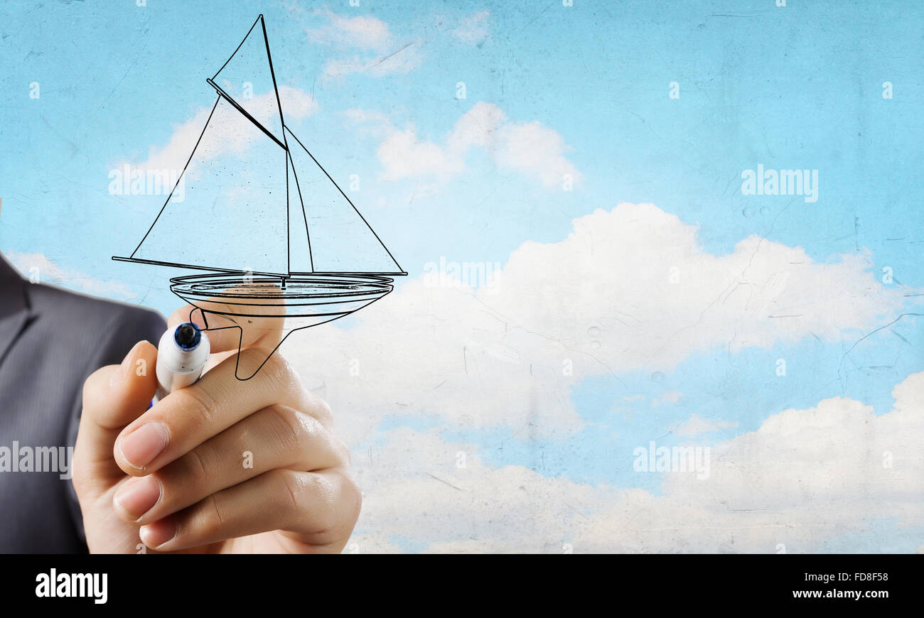Nahaufnahme der Geschäftsmann Hand Zeichnung Yacht mit marker Stockfoto
