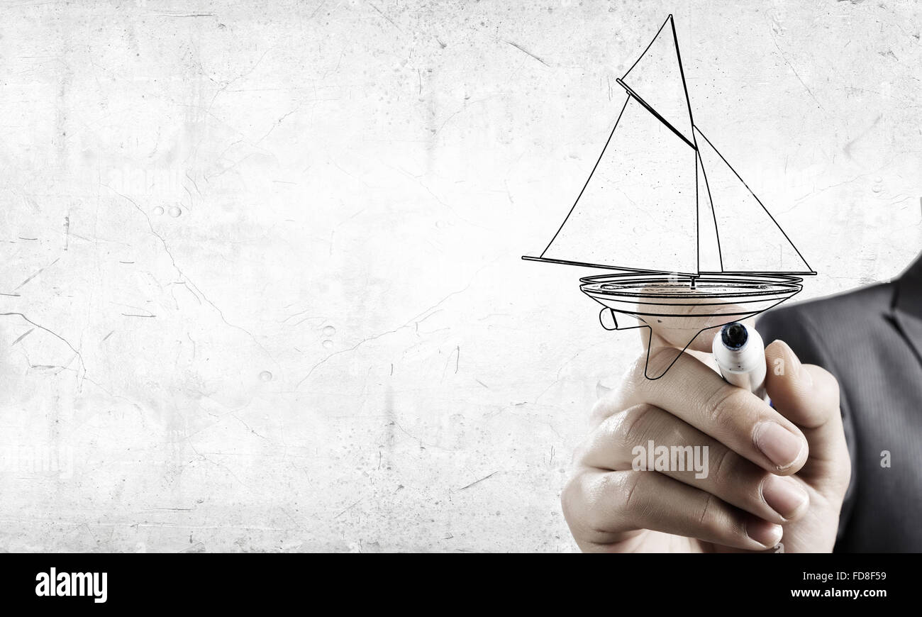 Nahaufnahme der Geschäftsmann Hand Zeichnung Yacht mit marker Stockfoto
