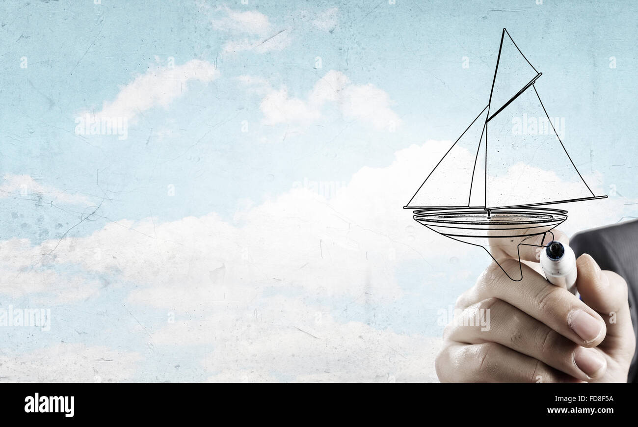 Nahaufnahme der Geschäftsmann Hand Zeichnung Yacht mit marker Stockfoto