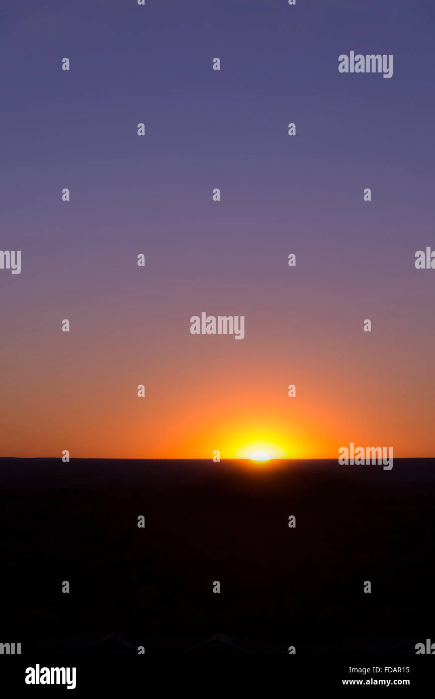 Sonne berühren Horizont Stockfoto