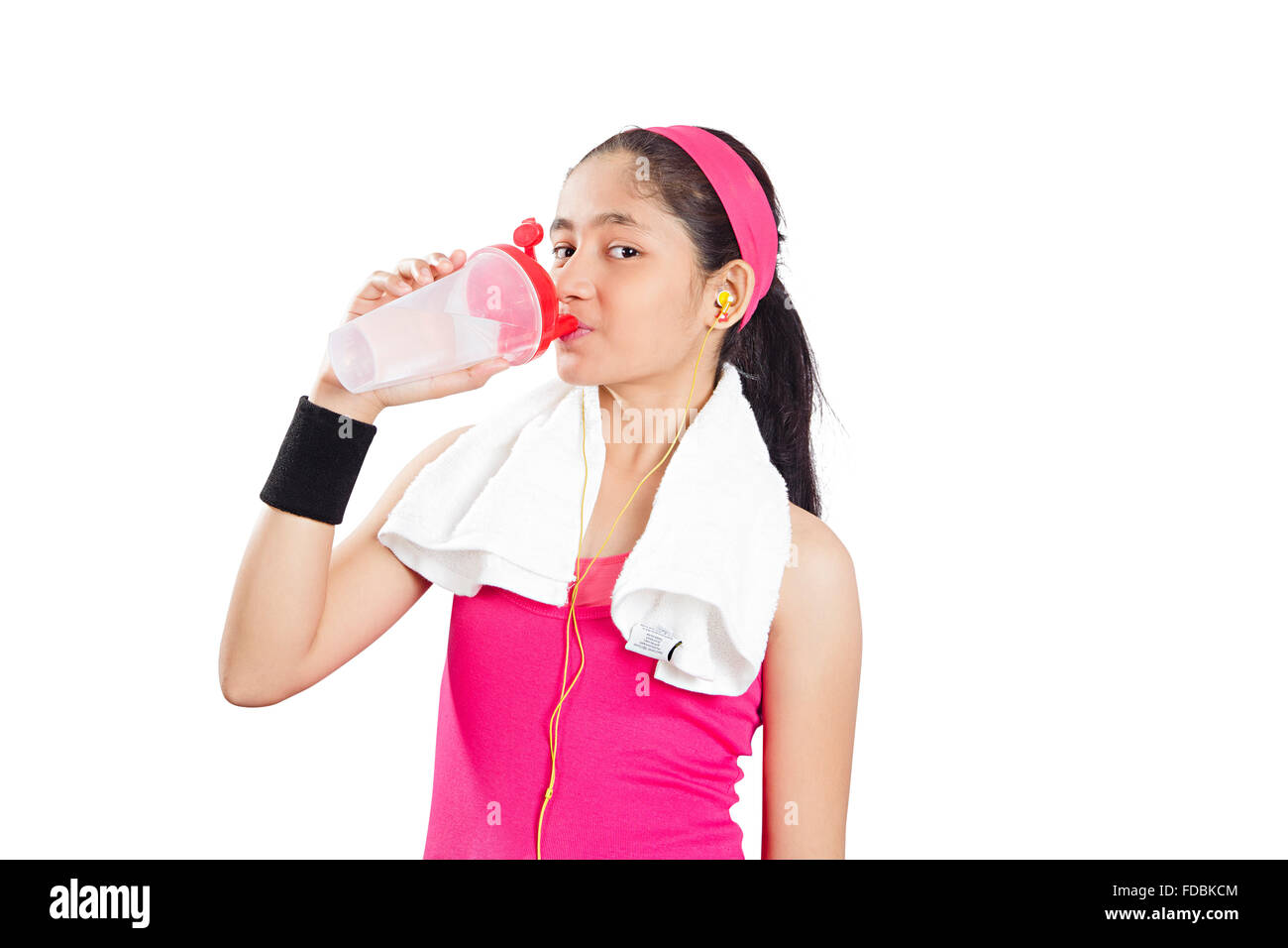 1 junge Teenager Girl Work-out steht Trinkwasser Stockfoto