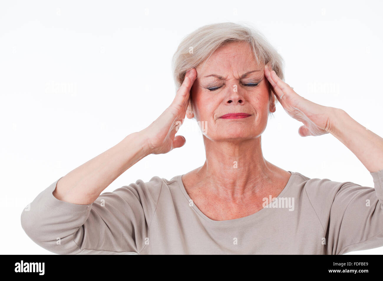Senior ältere Frau mit Migräne und Zahn Schmerzen Stockfoto