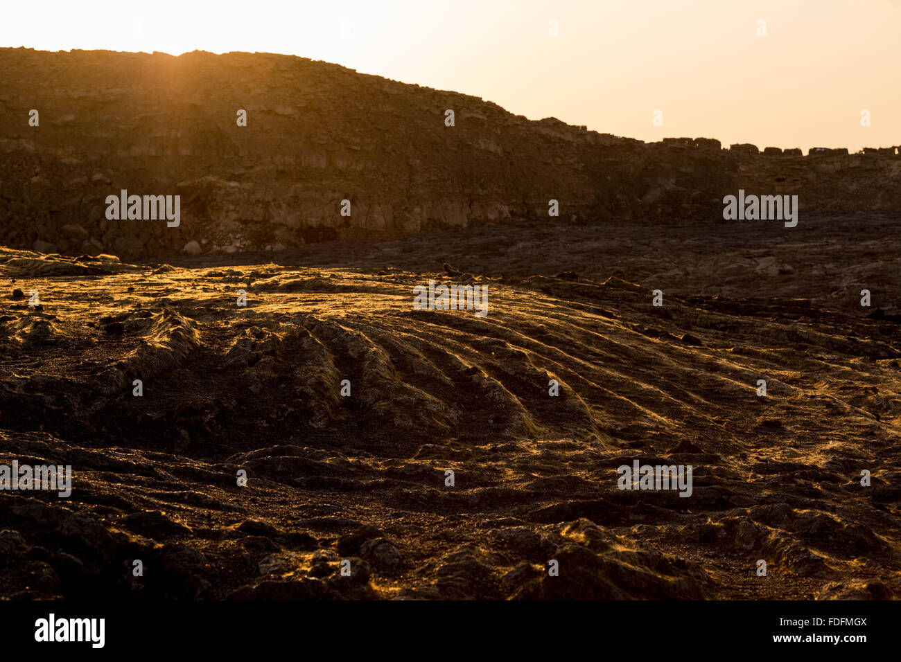 Abendlicht fängt den goldenen Peles Haar auf dem Gipfel des Erta Ale Stockfoto