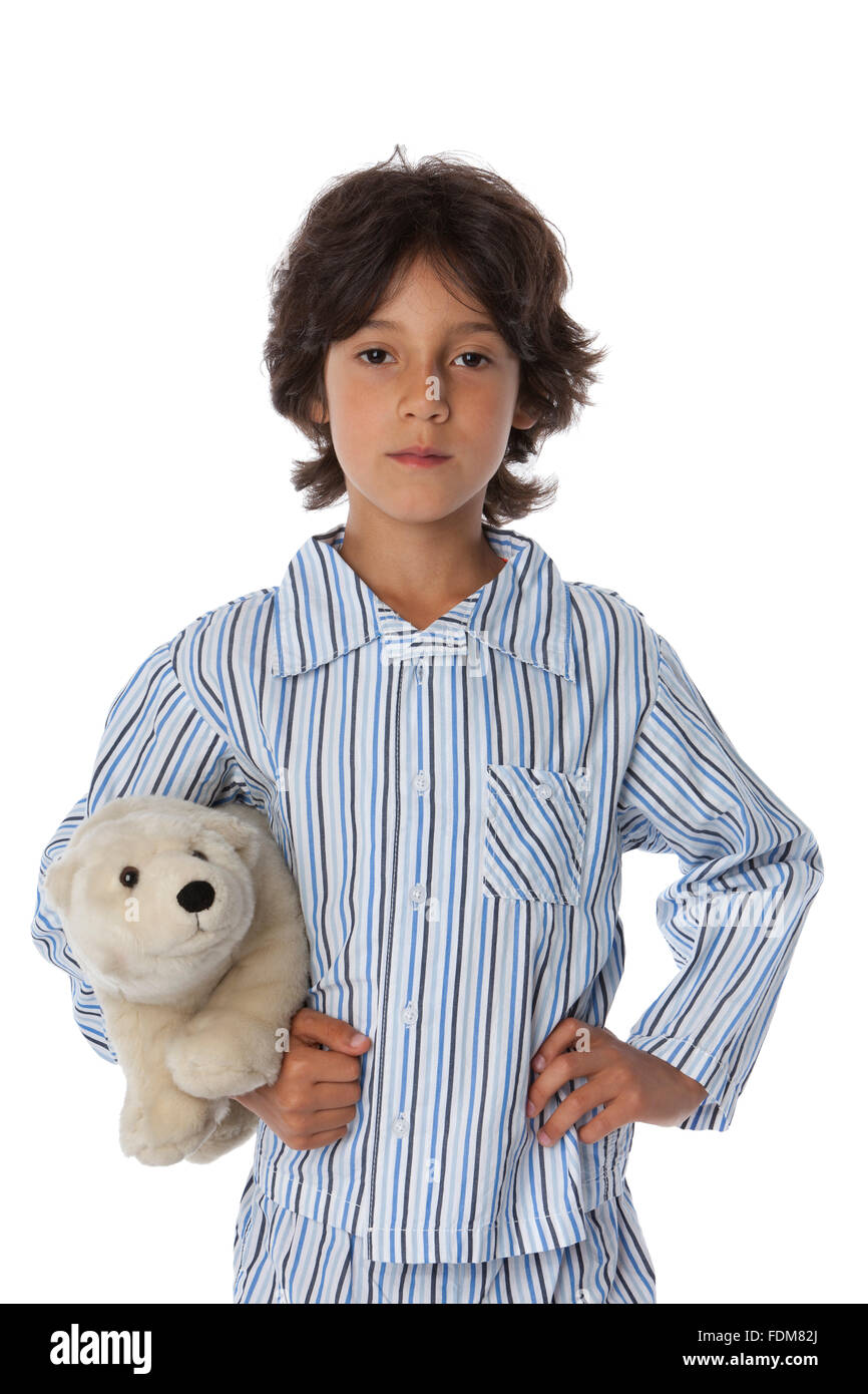 Kleiner Junge im Pyjama, bettfertig auf weißem Hintergrund Stockfoto
